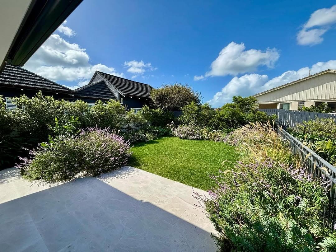 Garden with manicured lawn and borders